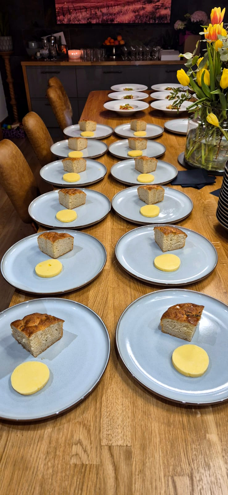 Focaccia and butter plated for every guest