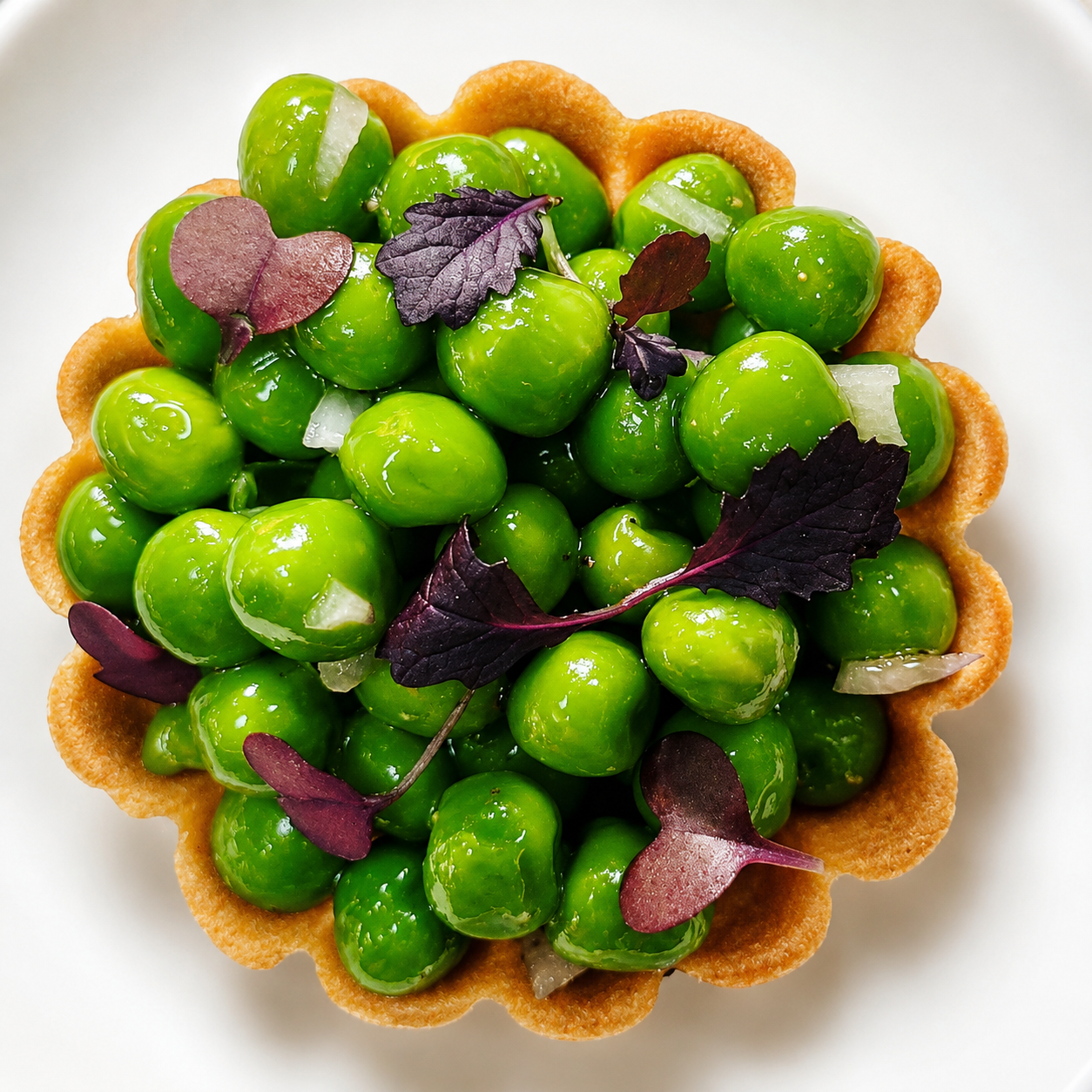 Pea tartlet with shiso and pickled onion