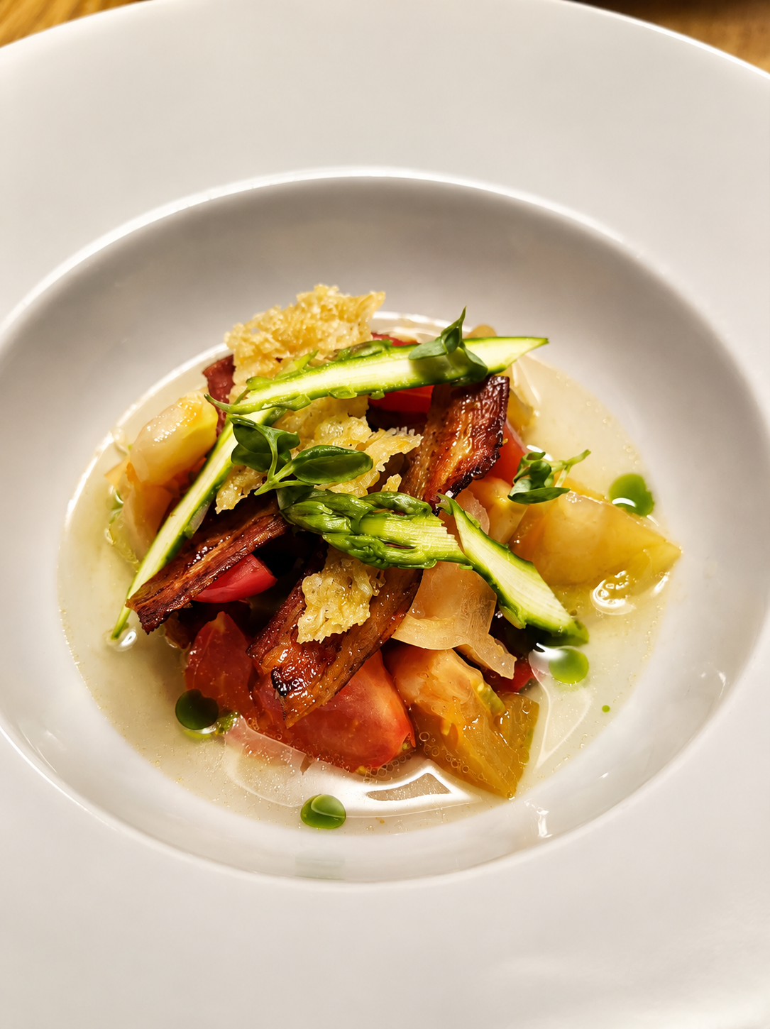 Asparagus, heritage tomato and crisp pancetta plate